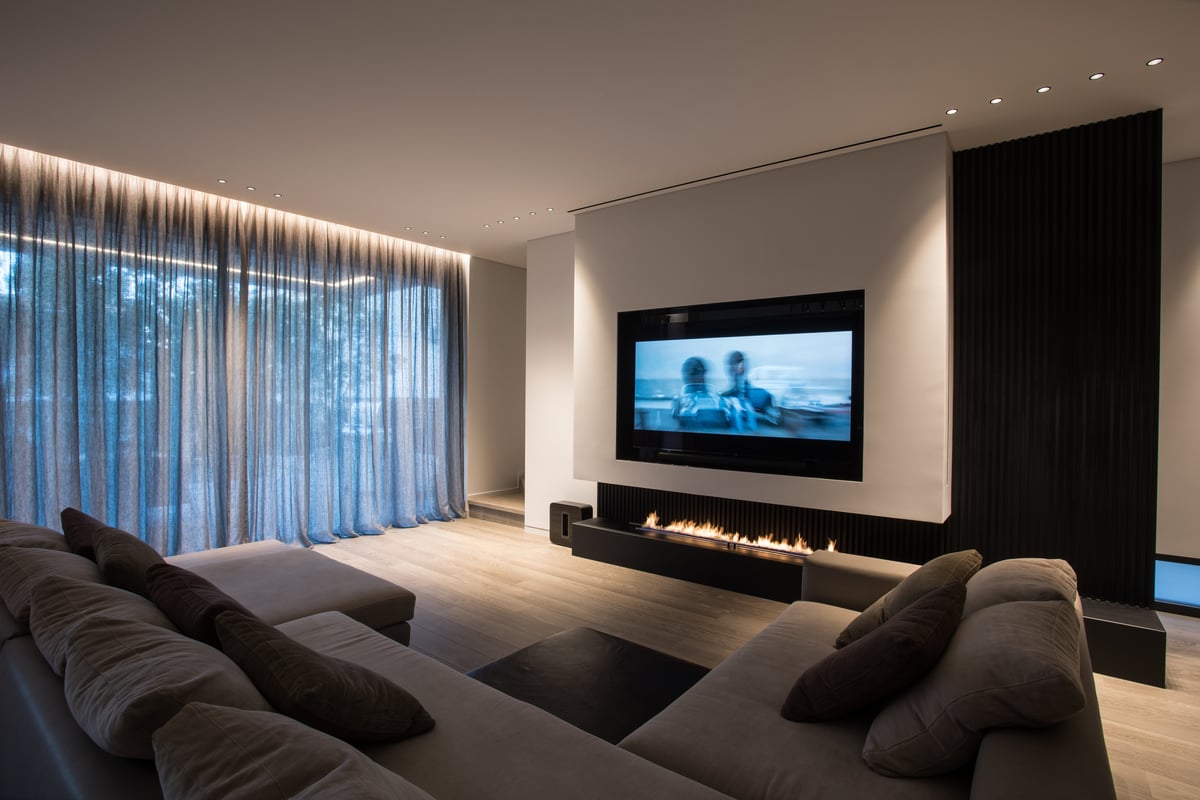 Modern media wall with real fire fireplace